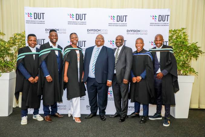 Group photo at DUT branded backdrop
