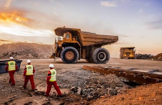 Large haul truck moving through mining site