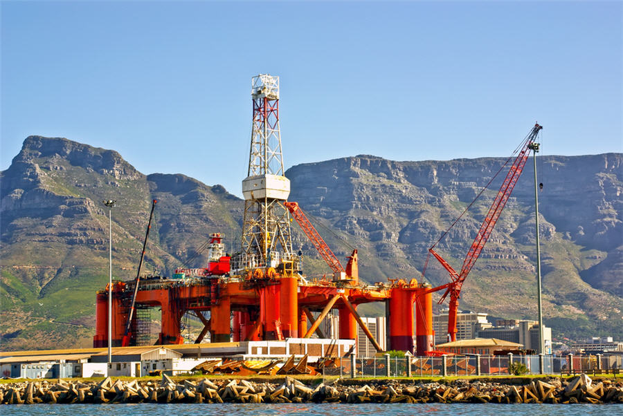 Oil and mining rig near Cape Town with mountain backdrop